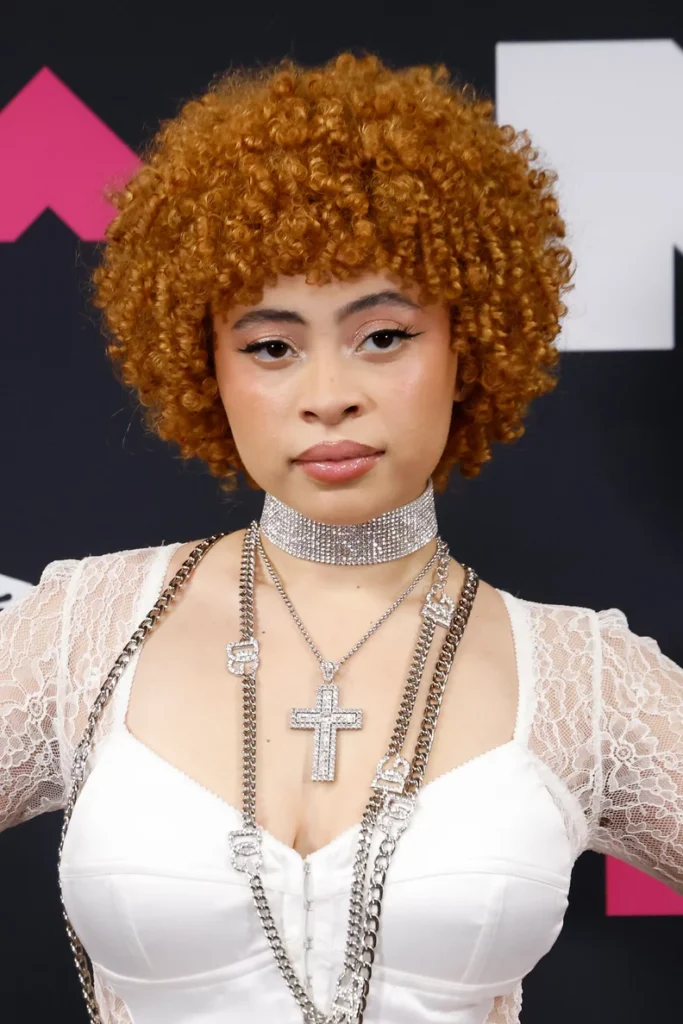 Ice Spice Wearing A Christian Cross Necklace