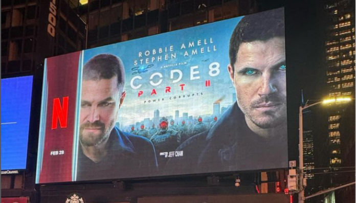 Stephen Amell With His Recent Project Shown In Times Square