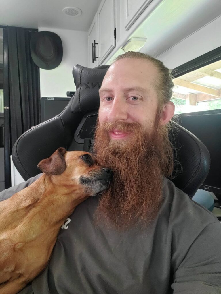 Nate Petroski With His Dog Minion