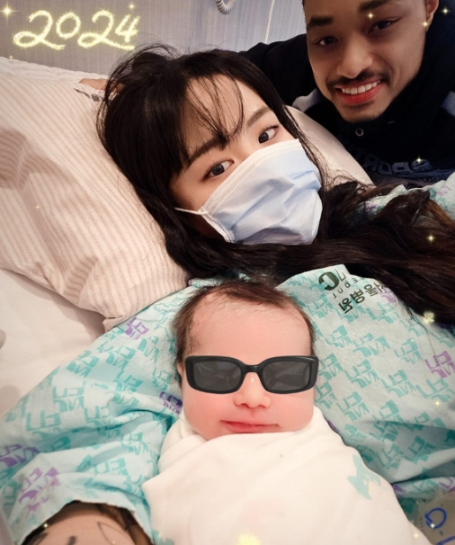 Tron Austin With His Wife, Jeong, And Their New Born Baby